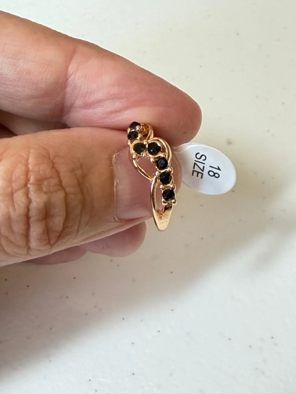 Gold and Black Gemstone Ring.